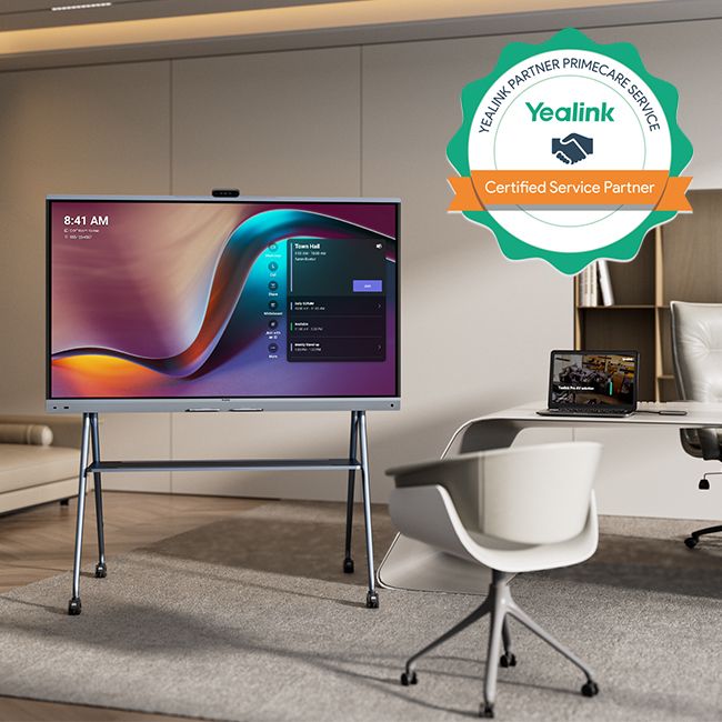 Ein MeetingBoard Pro von Yealink steht auf einem mobilen Ständer in einem Büro. Daneben ist das Logo des Yealink Certified Service Partner abgebildet